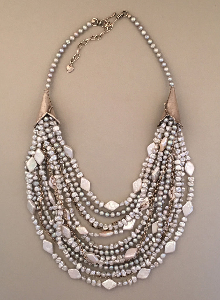 Multi-strand freshwater pearl and sterling silver statement necklace.  Handcrafted, one-of-a-kind.